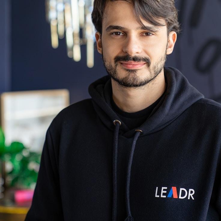 Kaveri Mehta, Lead Design Curator at Simple Creation Network, reviewing corporate floral arrangements